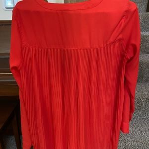Red tunic blouse
